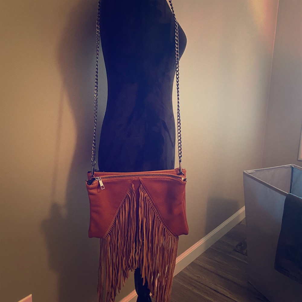 The Buckle: Camel brown handbag with fringe